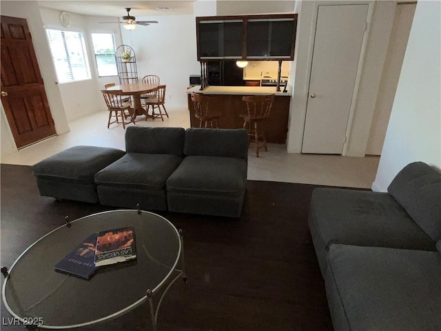 living room with a ceiling fan