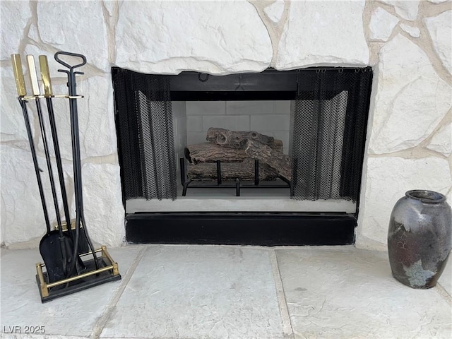 interior details featuring a fireplace