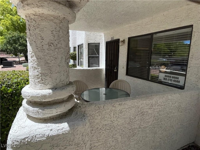 view of patio / terrace with a balcony