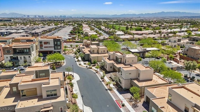 drone / aerial view with a mountain view and a residential view