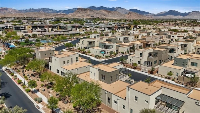 drone / aerial view with a mountain view and a residential view