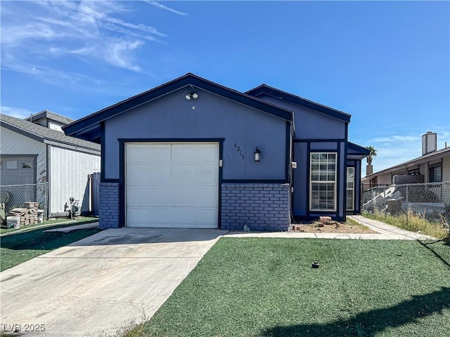 ranch-style home featuring a garage, a front lawn, fence, brick siding, and concrete driveway