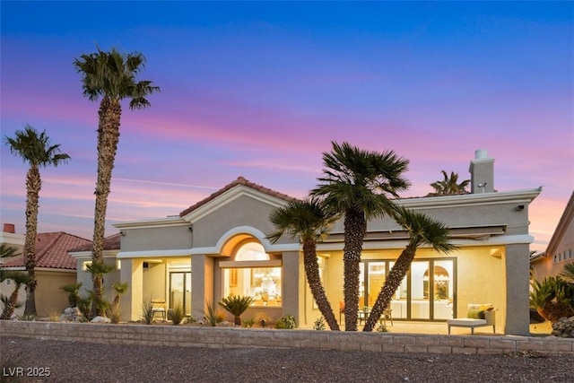 view of front of property featuring stucco siding
