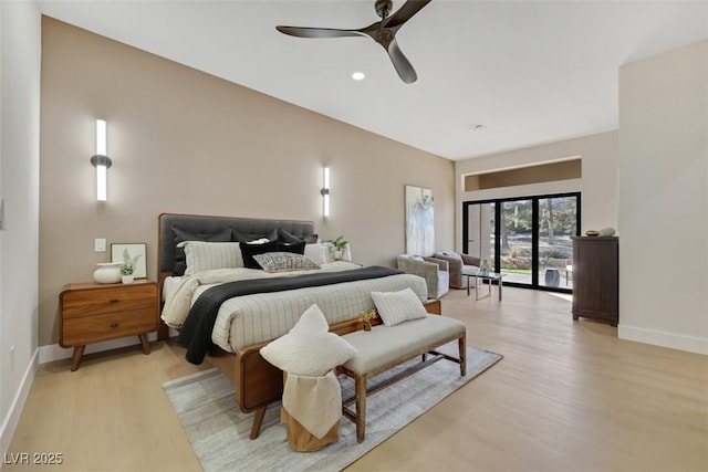 bedroom with baseboards, ceiling fan, and light wood finished floors