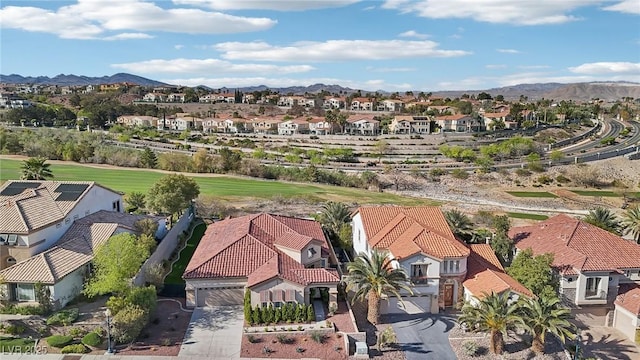 birds eye view of property with a residential view and a mountain view