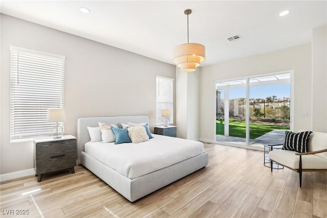 bedroom with access to outside, recessed lighting, baseboards, light wood-type flooring, and visible vents