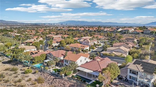 drone / aerial view with a residential view and a mountain view