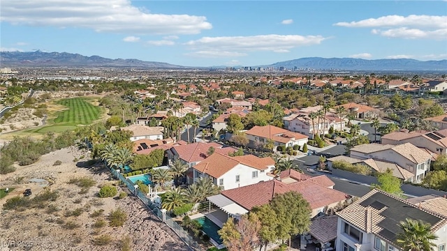drone / aerial view featuring a residential view and a mountain view