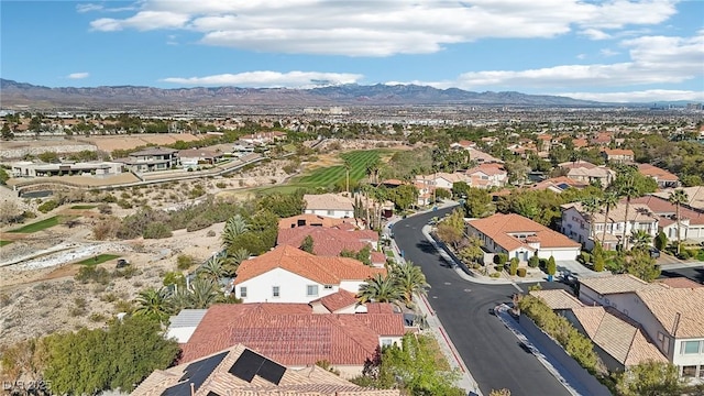 drone / aerial view with a residential view and a mountain view