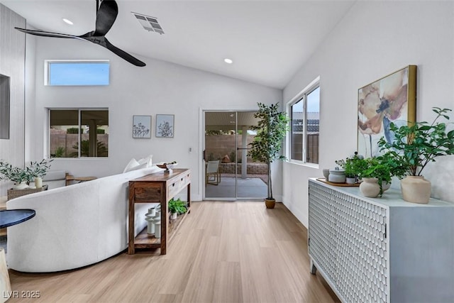 interior space featuring recessed lighting, visible vents, wood finished floors, and lofted ceiling