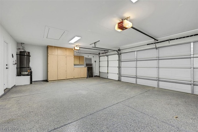 garage with water heater and a garage door opener