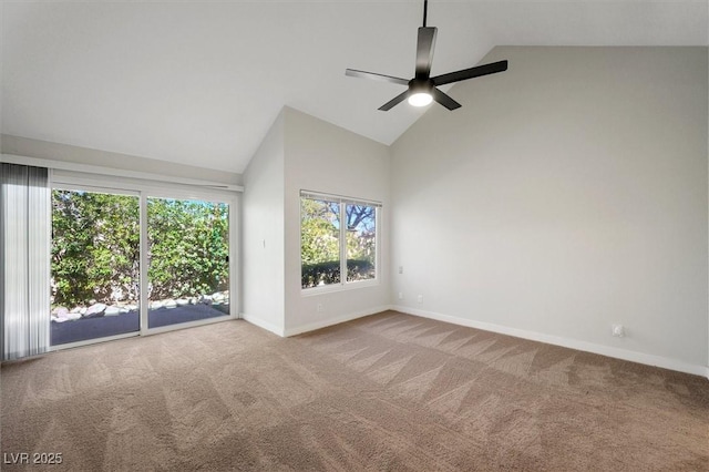 carpeted empty room featuring baseboards, a ceiling fan, and high vaulted ceiling