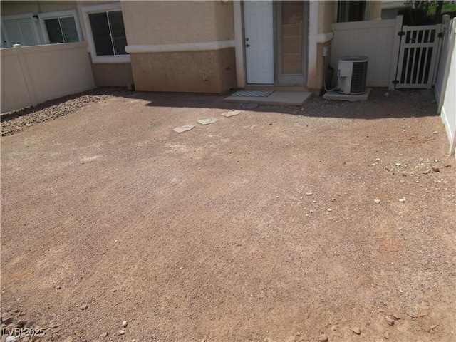 view of patio / terrace featuring fence and cooling unit