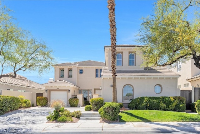2933 Red Springs Dr, Las Vegas, NV 89135 - mediterranean / spanish-style home featuring concrete driveway, stucco siding, a tile roof, and a garage