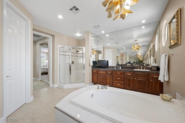 2933 Red Springs Dr, Las Vegas, NV 89135 - full bath with a shower stall, a ceiling fan, a garden tub, double vanity, and tile patterned flooring