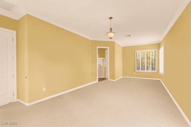 2318 Shorewood Hills Ave, Henderson, NV 89052 - empty room with crown molding, baseboards, visible vents, and light colored carpet