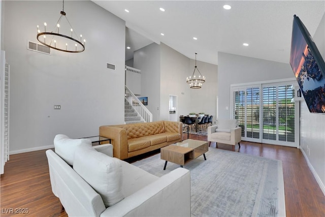 4680 Freshwater Dr, Las Vegas, NV 89103 - living area featuring high vaulted ceiling, a chandelier, recessed lighting, baseboards, and visible vents
