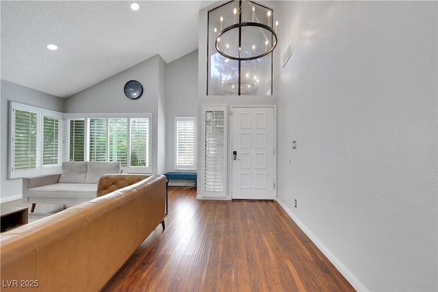 4680 Freshwater Dr, Las Vegas, NV 89103 - living room featuring high vaulted ceiling, baseboards, recessed lighting, and wood finished floors