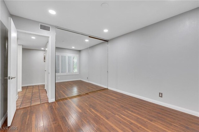 4680 Freshwater Dr, Las Vegas, NV 89103 - below grade area featuring visible vents, recessed lighting, baseboards, and wood finished floors