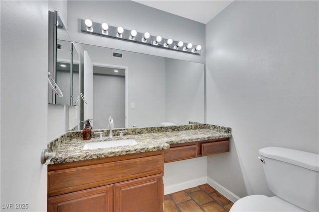 4680 Freshwater Dr, Las Vegas, NV 89103 - half bath with toilet, baseboards, visible vents, and vanity
