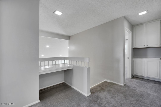 4680 Freshwater Dr, Las Vegas, NV 89103 - hall featuring baseboards, carpet flooring, and a textured ceiling