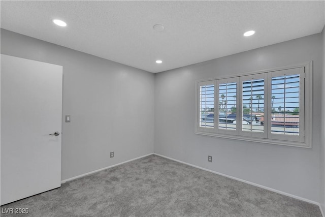 4680 Freshwater Dr, Las Vegas, NV 89103 - carpeted empty room featuring recessed lighting and baseboards