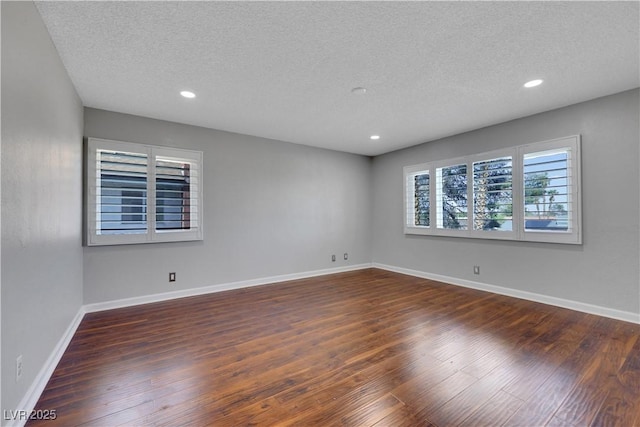 4680 Freshwater Dr, Las Vegas, NV 89103 - empty room with recessed lighting, a textured ceiling, baseboards, and dark wood-type flooring