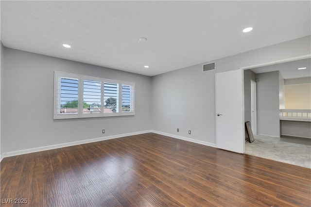 4680 Freshwater Dr, Las Vegas, NV 89103 - empty room with baseboards, recessed lighting, wood finished floors, and visible vents