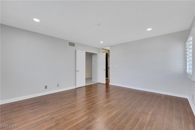4680 Freshwater Dr, Las Vegas, NV 89103 - unfurnished room with baseboards, recessed lighting, wood finished floors, and visible vents