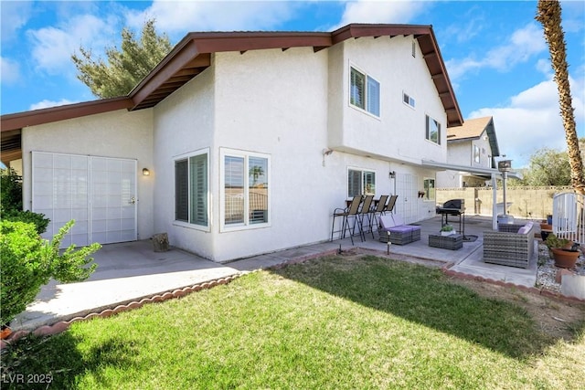 4680 Freshwater Dr, Las Vegas, NV 89103 - rear view of house featuring a yard, fence, a patio area, and stucco siding