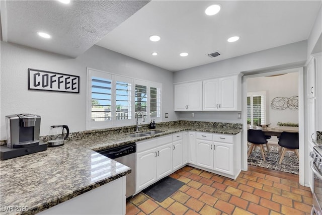 4680 Freshwater Dr, Las Vegas, NV 89103 - kitchen featuring visible vents, appliances with stainless steel finishes, a sink, recessed lighting, and white cabinetry
