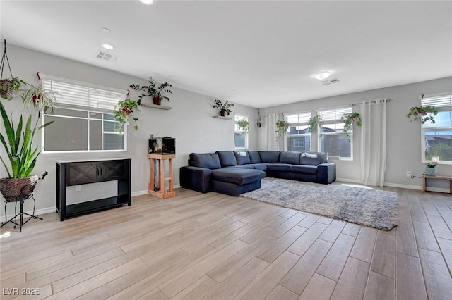 96 Campbelltown Ave, Henderson, NV 89015 - living room with baseboards, recessed lighting, wood finished floors, and visible vents