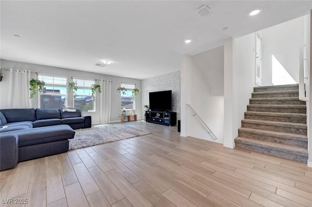 96 Campbelltown Ave, Henderson, NV 89015 - living room with recessed lighting, light wood-type flooring, and stairs