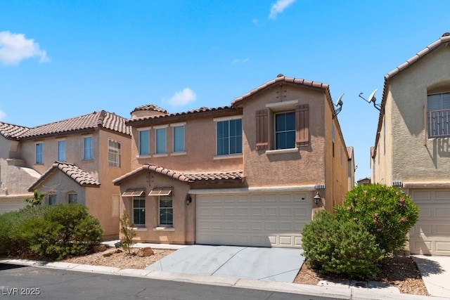 view of front of house featuring a tiled roof, a garage, concrete driveway, and stucco siding