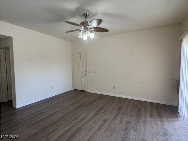 1050 E Cactus Ave Unit 2110, Las Vegas, NV 89183 - spare room with a ceiling fan, dark wood-style flooring, and baseboards