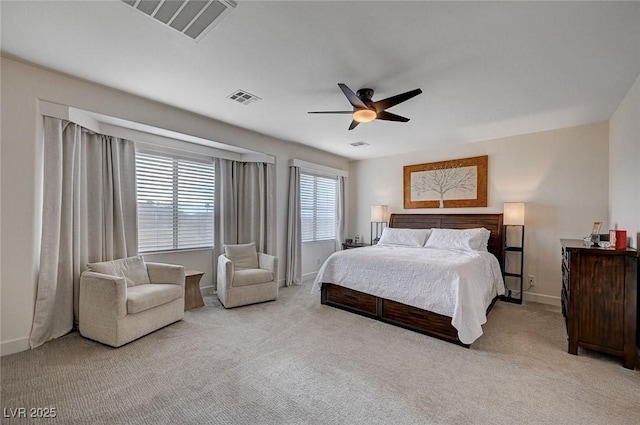 bedroom with visible vents, carpet flooring, and baseboards