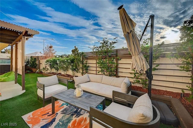 view of patio with a fenced backyard and an outdoor hangout area