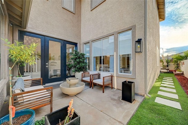 view of patio / terrace featuring an outdoor hangout area and french doors