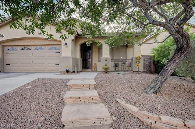 ranch-style house with an attached garage, driveway, and stucco siding
