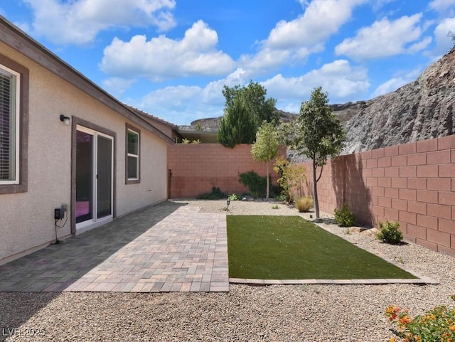 1063 Upper Springs St, Henderson, NV 89002 - view of yard featuring a patio area and a mountain view