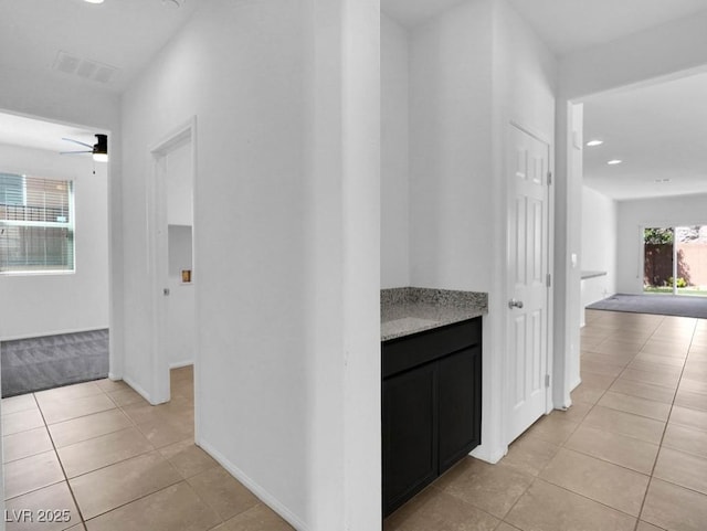 1063 Upper Springs St, Henderson, NV 89002 - corridor featuring light tile patterned floors, recessed lighting, and baseboards