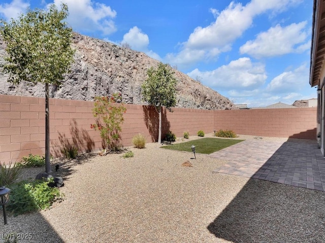 1063 Upper Springs St, Henderson, NV 89002 - fenced backyard with a patio area