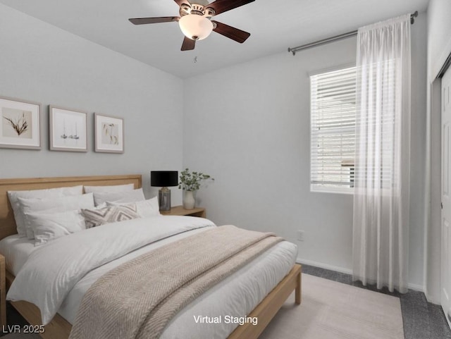 1063 Upper Springs St, Henderson, NV 89002 - bedroom with carpet floors, ceiling fan, and baseboards