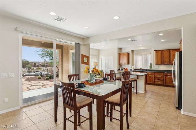 8316 Imperial Lakes St, Las Vegas, NV 89131 - dining space featuring recessed lighting, baseboards, and light tile patterned flooring