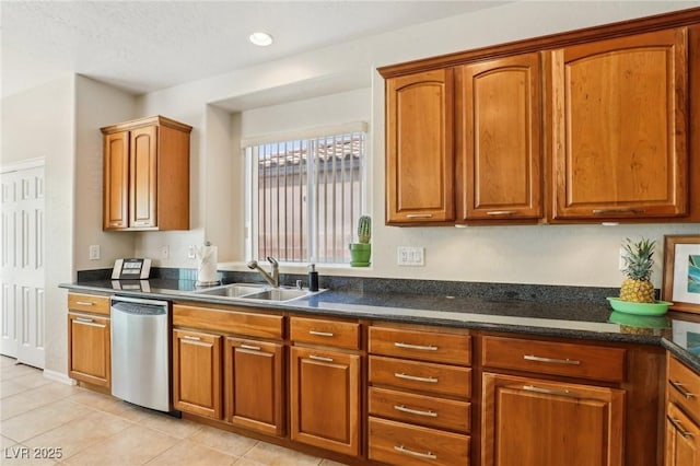 8316 Imperial Lakes St, Las Vegas, NV 89131 - kitchen featuring stainless steel dishwasher, a sink, light tile patterned floors, brown cabinetry, and recessed lighting