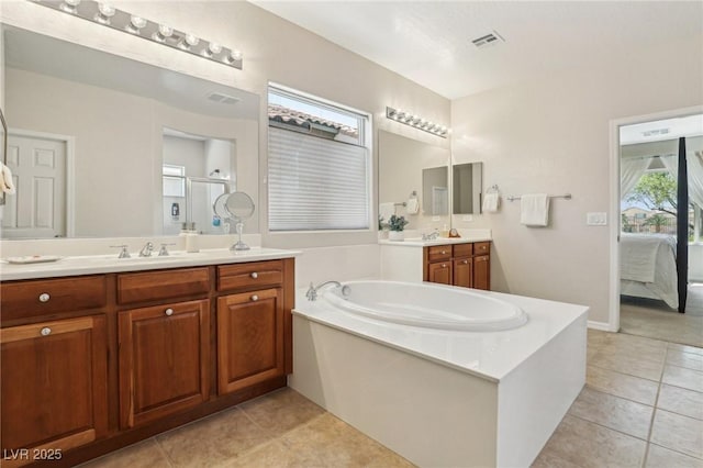 8316 Imperial Lakes St, Las Vegas, NV 89131 - ensuite bathroom with a bath, tile patterned floors, and vanity