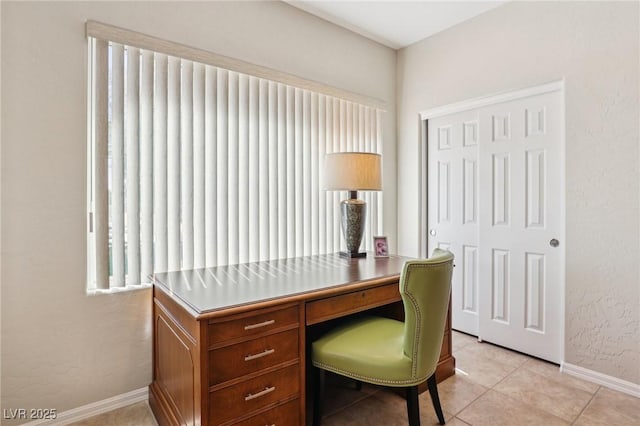 8316 Imperial Lakes St, Las Vegas, NV 89131 - office with baseboards, light tile patterned flooring, and a textured wall