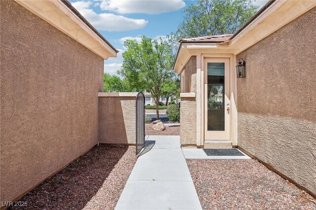 8316 Imperial Lakes St, Las Vegas, NV 89131 - view of exterior entry featuring stucco siding