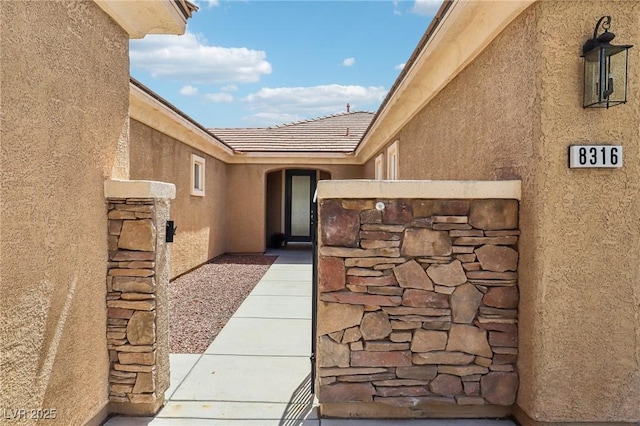 8316 Imperial Lakes St, Las Vegas, NV 89131 - property entrance featuring stucco siding
