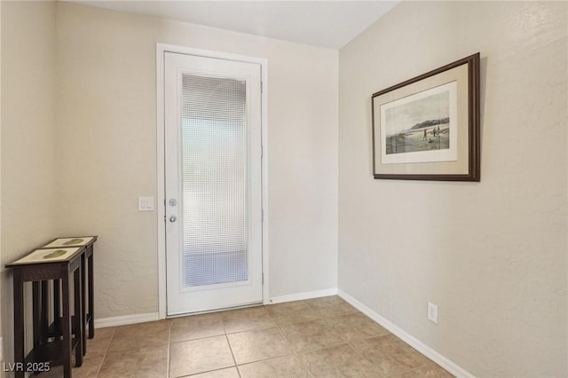 8316 Imperial Lakes St, Las Vegas, NV 89131 - entryway featuring light tile patterned flooring and baseboards